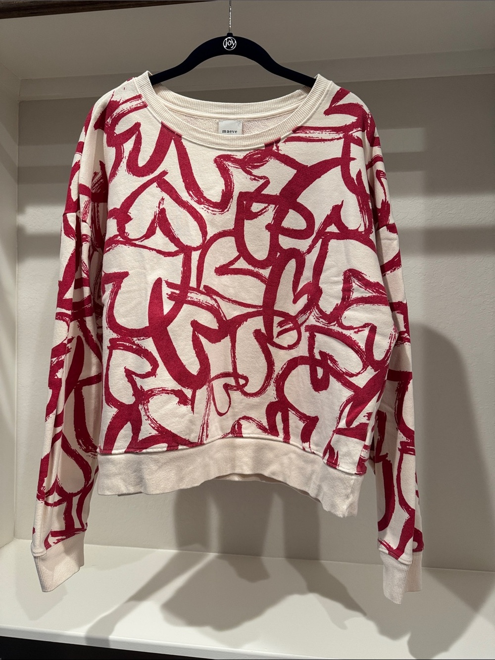 Maeve Cream Crewneck Sweatshirt with Bold Pink-Red Brushstroke Print